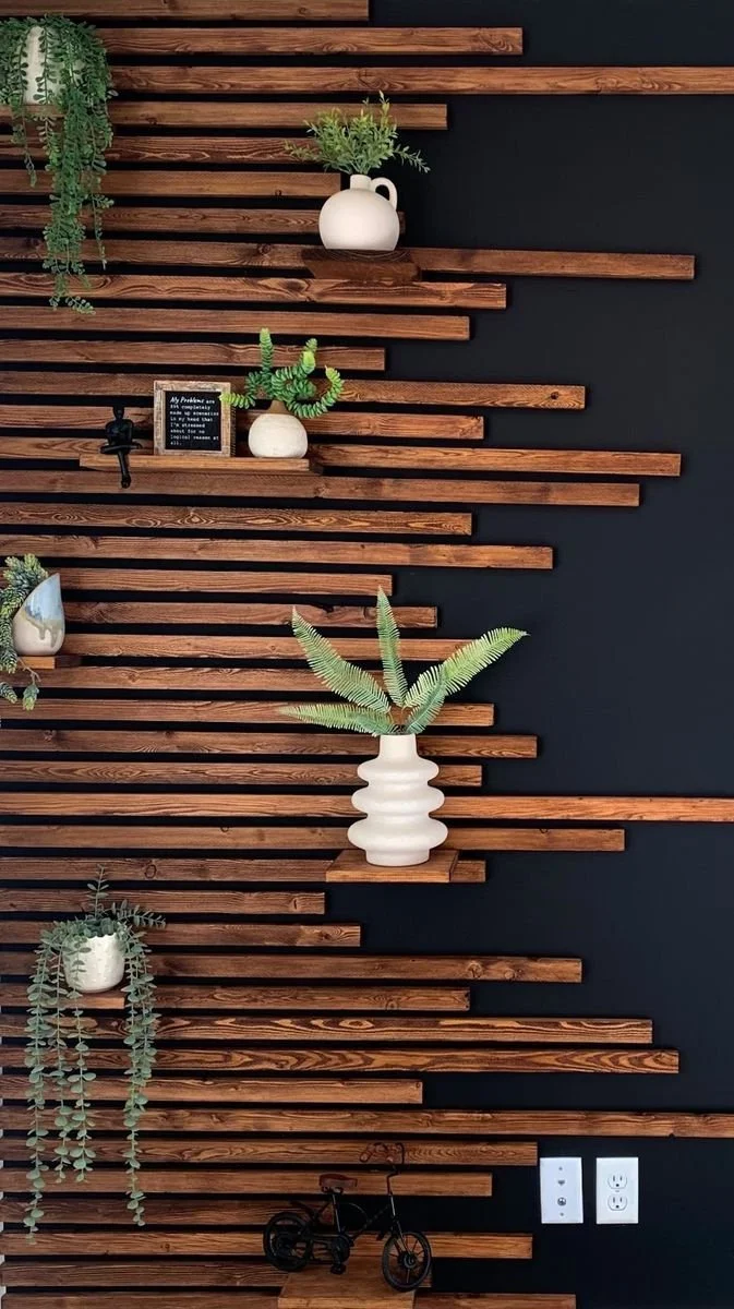 30M views · 1.6M reactions | Another fun little house project completed! ✨ I thought my dad was joking when he asked me if I had run out of nails to finish the wood on the other side, but he was being 100% serious | Sariah Howell