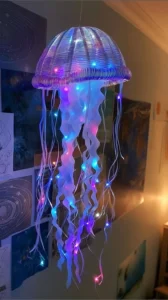 Colorful DIY jellyfish craft made from materials for home decoration.
